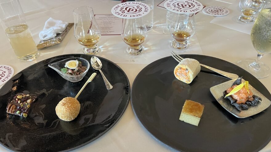 Tasting glasses and food pairing plates at a Glendronach seminar